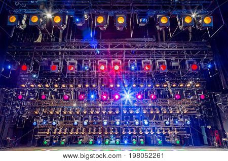 Spotlights & lighting equipment for the theater. Multi-colored lights.