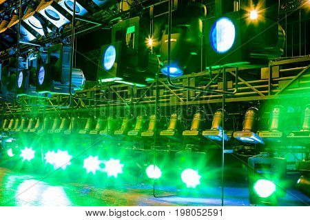 Spotlights & lighting equipment for the theater. Multi-colored lights.