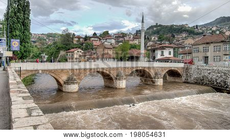 SARAJEVO, BOSNIA AND HERZEGOVINA - May 1 2014: Bridge on Miljacka river in Sarajevo the capital city of Bosnia and Herzegovina