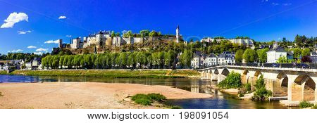 Landmarks of France - panoramic view of Chinon with royal castle. Famous castles of Loire valley