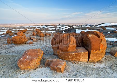 Unusual round red boulders in Red Rock Coulee in Southern Alberta, Canada.