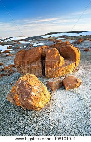 Unusual round red boulders in Red Rock Coulee in Southern Alberta, Canada.
