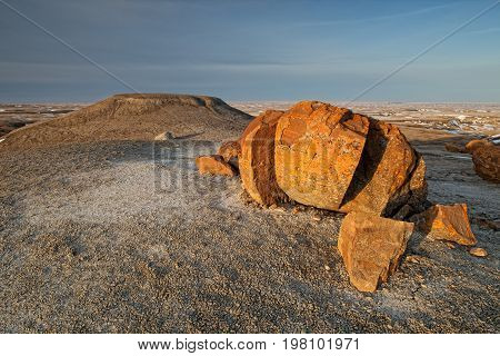 Unusual round red boulders in Red Rock Coulee in Southern Alberta, Canada.