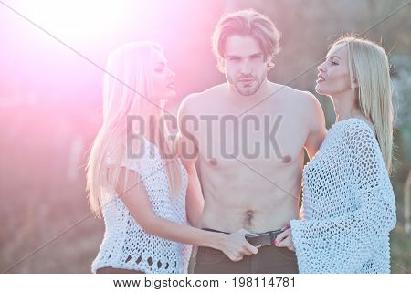 Man With Muscular Body With Twins.