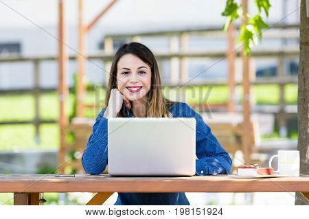 Young Woman Turning To Stare At The Camera