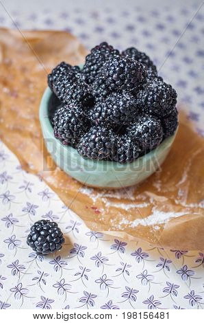 Homemade, sweet, delicious blackberries in a handmade dish