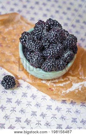 Homemade, sweet, delicious blackberries in a handmade dish