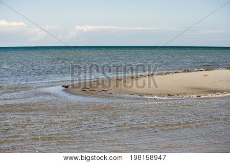 View from sanddune at Bloeden Hale over the beach Laesoe Island in Kattegat sea Denmark.