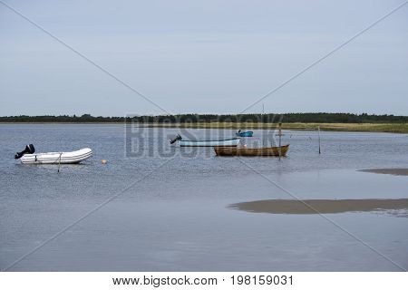Fishing boats in the bay at Bloeden Hale Laesoe Island in Kattegat sea Denmark.