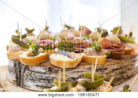 Tomatoes and cheese. Banquet feasts. Banquet table