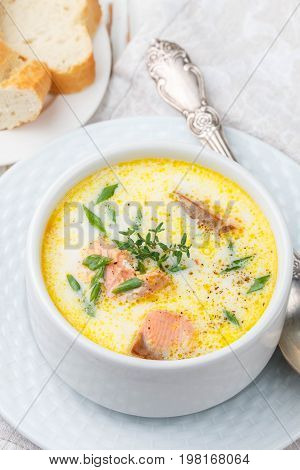 Creamy fish soup with salmon potatoes onions and carrots. Kalakeitto. Traditional dish of the Finnish cuisine