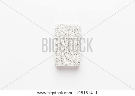 white pumice-stone. pumice-stone on the white background. white pumice-stone not isolated. white pumice-stone central composition