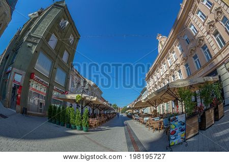 NOVI SAD SERBIA - JULY 30 2017: Dunavska Street one of the oldest streets in center of Novi Sad. A pedestrian zone with pubs restaurants boutique.