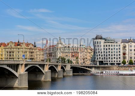 Jiraskow Bridge leading to the Dancing House in Prague, Czech Republic