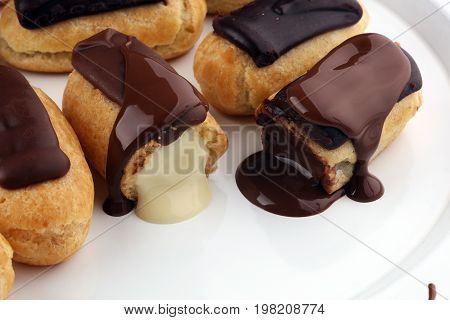 Traditional French Dessert. Eclair With Chocolate Icing. Pastery Concept