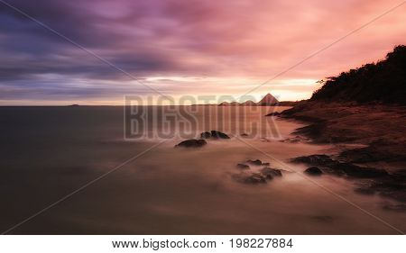 Stunning Sunset On The Beach. Beautiful Colors And Dramatic Clouds At The Sky.