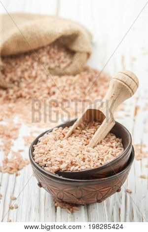 Raw Organic Devzira Rice On A White Table