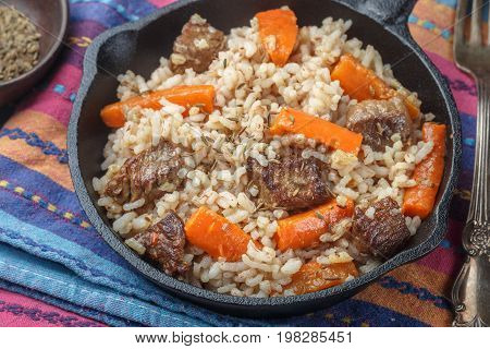 Devzira Pilaf With Lamb, Onions, Carrots And Spices (cumin, Coriander, Pepper). Traditional Dishes O