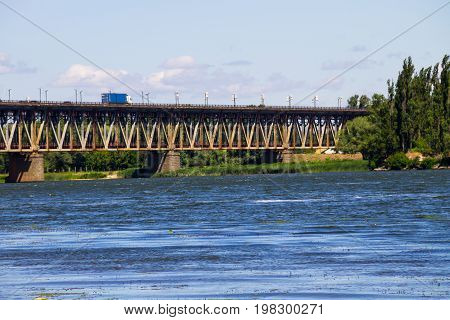 Bridge With Traffic Over The Dnieper River In Kremenchug, Ukraine