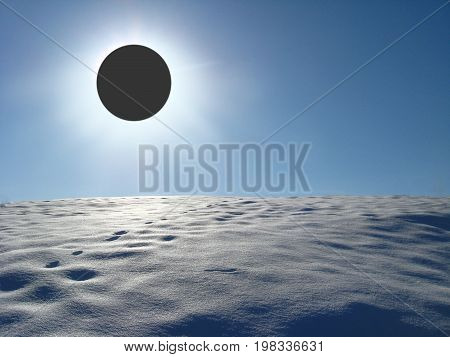 Winter landscape with solar eclipse above the snowy desert. Solar eclipse above the snow