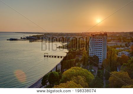 Evening sunset over black sea. Sukhum, Abkhazia. Aerial view
