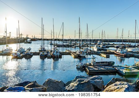 Rimouski Canada - June 4 2017: Harbor Marina with boats during sunset in Quebec by Saint Lawrence river water