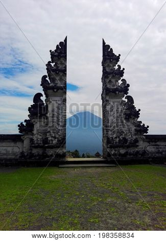 Pura Lempuyang, Bali, Indonesia - July 2017: The landscape to Agung volcano