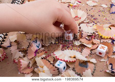 Colorful Alphabet Letter Cubes In Hand