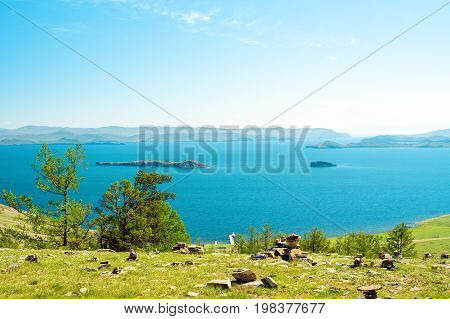 View of the Small Sea Strait, Lake Baikal, Russia. In the distance - Olkhon gate strait. On the left is Olkhon Island, on the right is the mainland