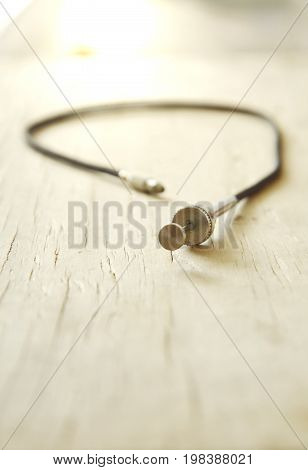 classic camera shutter cable released on wooden board