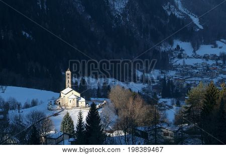 Prato Leventina Switzerland - 29 December 2010: Winter landscape with the church of Prato Leventina on the Swiss alps