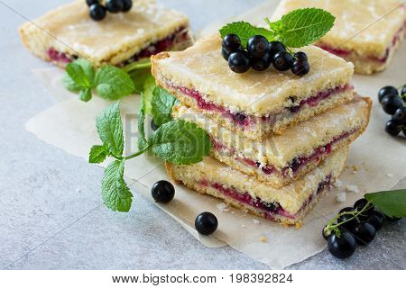Homemade Cookies With Black Currant Berries On A Gray Stone Or Slate Background. Summer Pastries. Co
