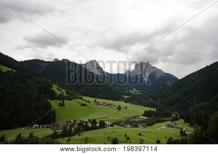 Dolomite landscapes in the summer green of Trentino