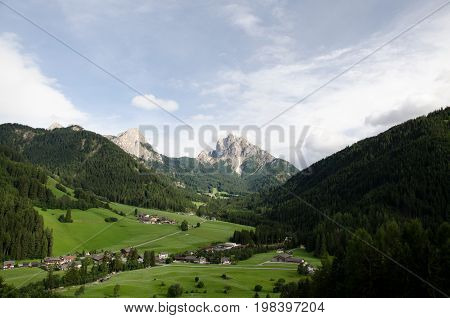 Dolomite landscapes in the summer green of Trentino