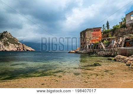 Sea Bay And Ruins Of House In Cloudy Weather In Balaklava, Sebastopol, Crimea