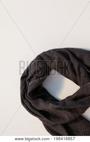 Close-up of wooly scarf on white background