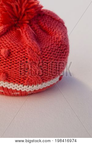 Close-up of wooly hat on white background