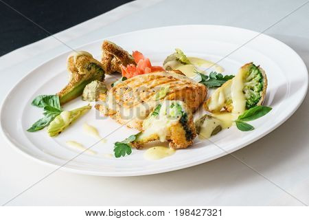 salmon steak with vegetables