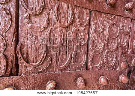 Door with horseshoes at antient abandoned city of Fatehpur Sikri n the Agra District of Uttar Pradesh, India.