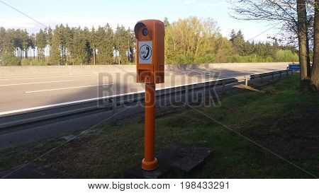 SOS phone/This is a emergency phone on the road.