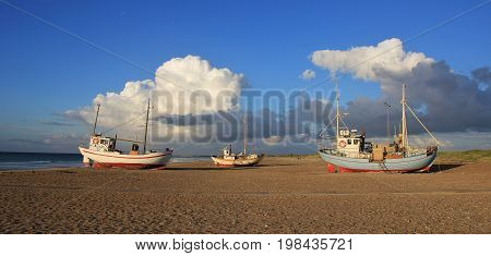 Fishing boats at the Slettestrand Denmark. Summer scene.