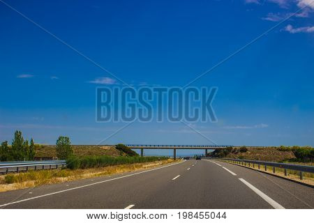Autovía N-631. Road, horizon, car. Spain. Picture taken - 29 july 2017.