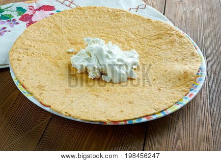 Guirila With Crumbled White Cheese.