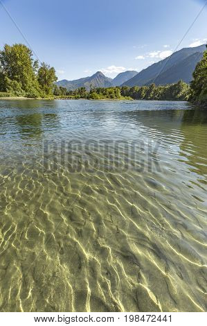 Vertical Views Of Mountains In The Background Of Wenatchee River Leavenworth Washington