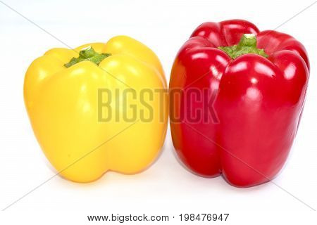 Fresh paprika (sweet peppersbell peppers) Red Yellow Peppers isolated on a white background with clipping path.