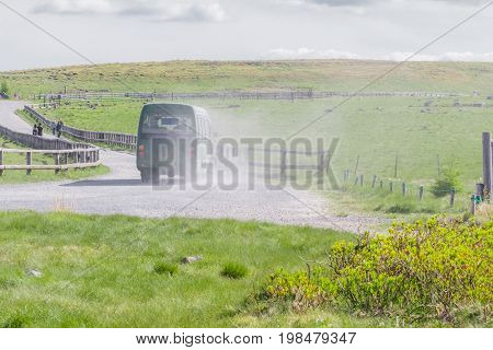 Green bus on a country road and beautiful landscape view of of Utsukushigahara is one of the most important and popular natural place in Nagano Japan.
