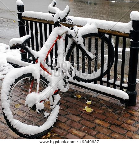 First snow of the season covers a mountain bike