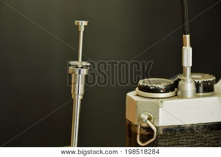 classic shutter cable released operated on film camera ready to shooting