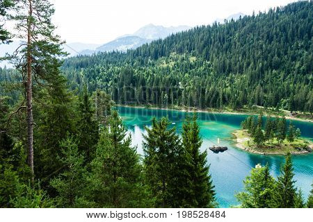 Caumasee in Switzerland lake with turquoise water for hiking and swimming