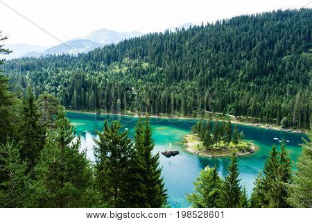 Caumasee in Switzerland lake with turquoise water for hiking and swimming